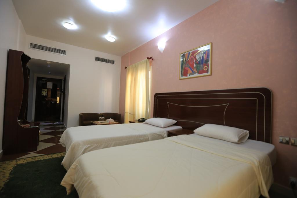 Sun City International Hotel Дубай Экстерьер фото